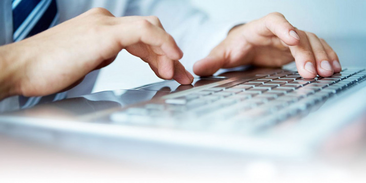 gallery/man-hands-on-laptop-fade-2